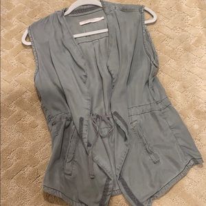 Adorable vest and turtle neck!